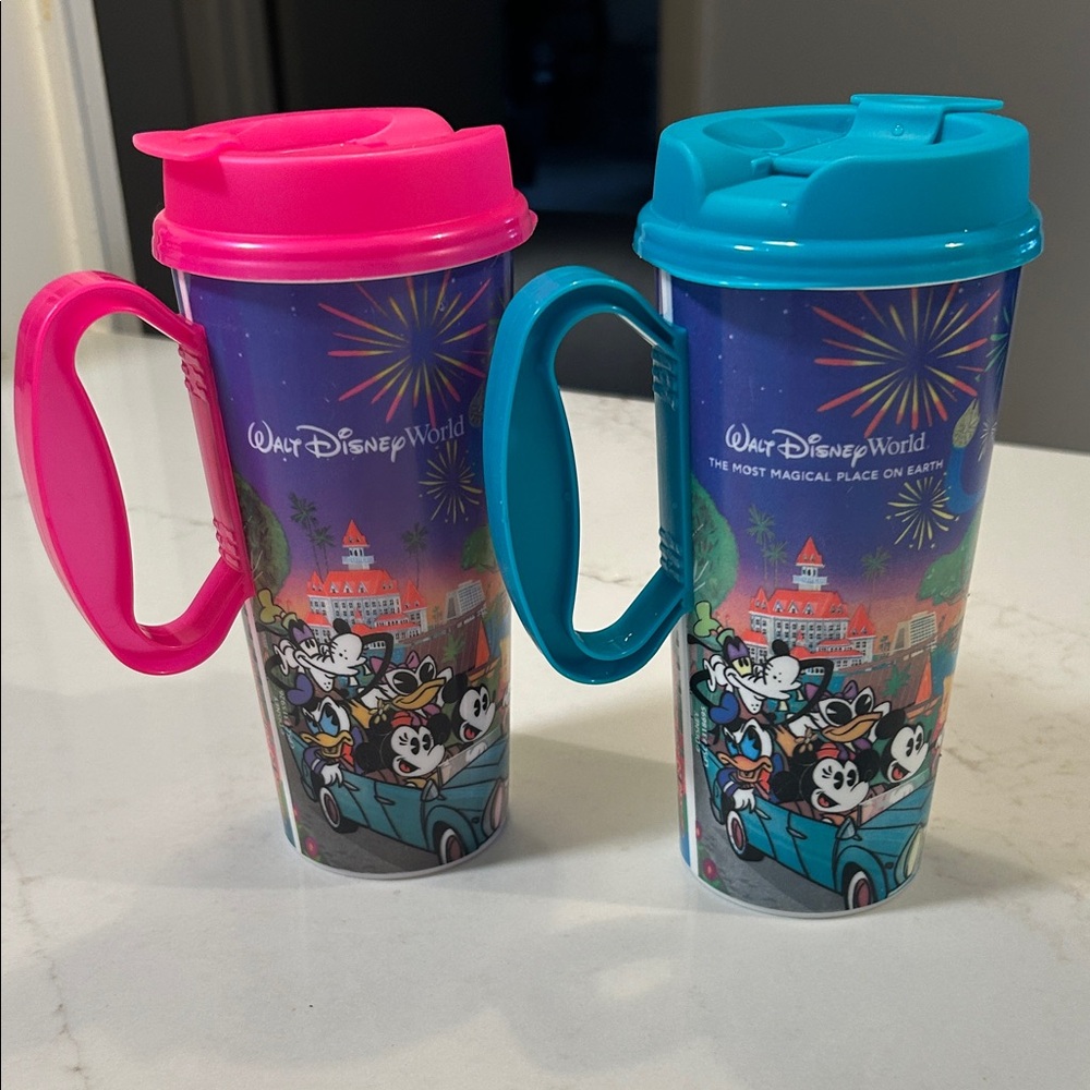 Walt Disney World Mugs  one - Pink one Blue